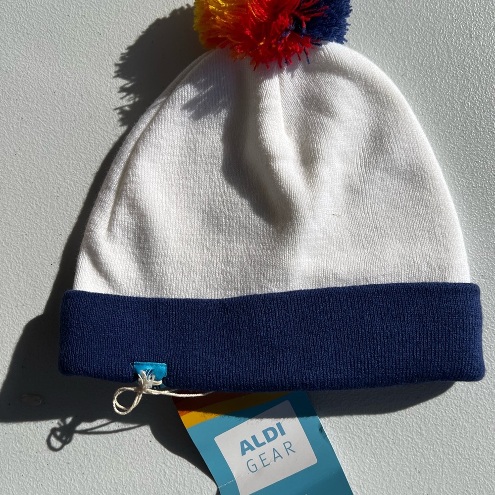 White and Blue Beanie with Colorful Pom-Pom